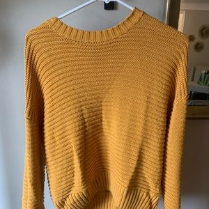 Yellow knitted sweater